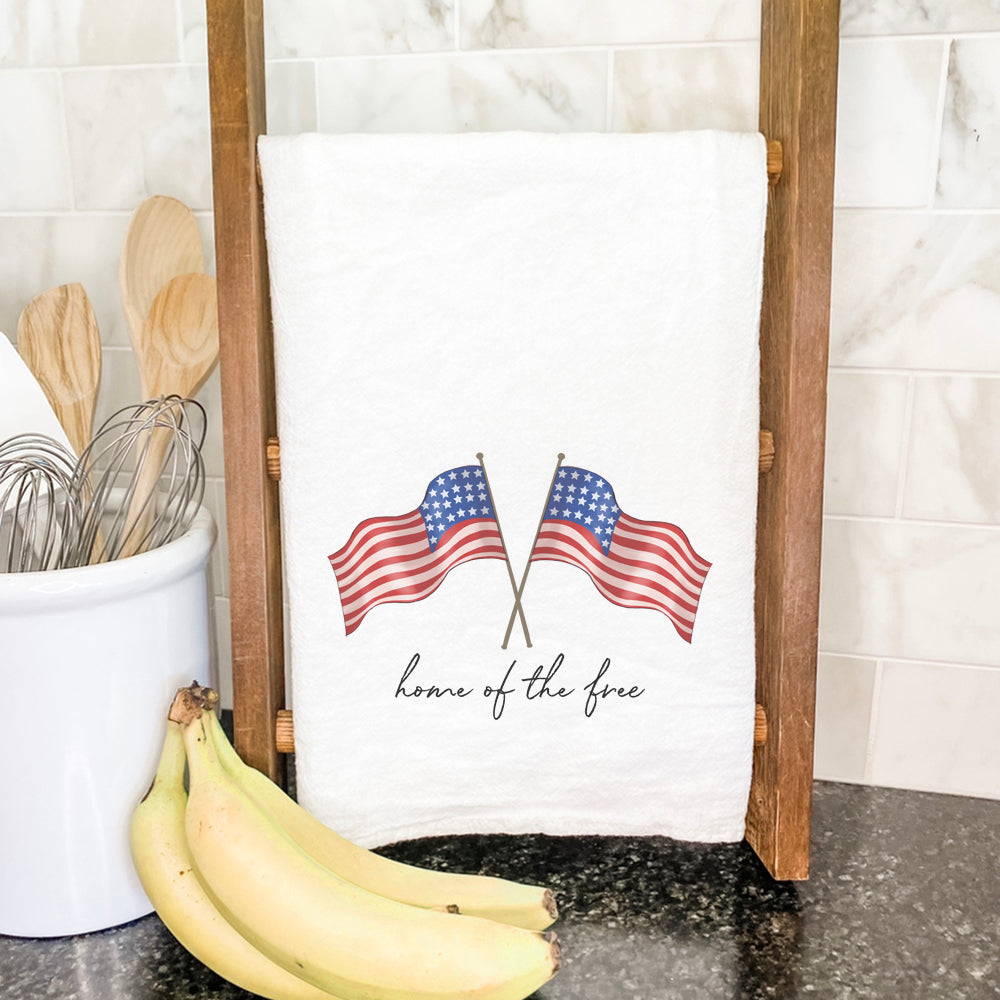 Home of the Free Flags cotton tea towel featuring a vibrant design, made from 100% absorbent cotton, measuring 27 inches square.