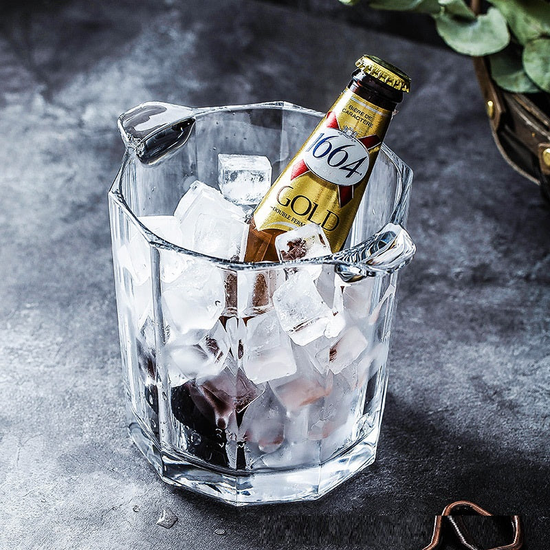 A stylish crystal glass ice bucket designed for chilling whisky, champagne, and red wine, featuring a sleek and elegant design.