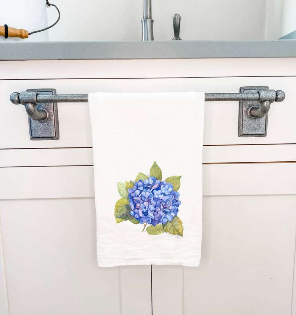 A vibrant Hydrangea Cotton Tea Towel featuring a beautiful floral design, made from 100% absorbent cotton, perfect for kitchen use.