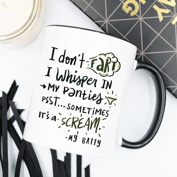 A humorous coffee mug with the phrase 'I Don't Fart. I Whisper' printed on it, showcasing a fun design perfect for gifting.