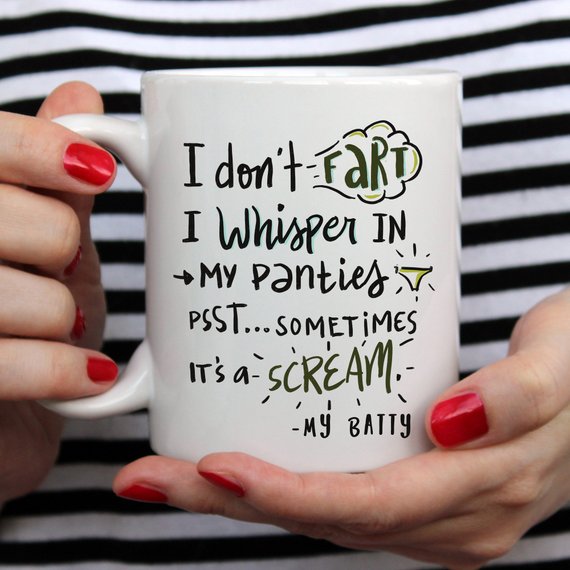 A humorous coffee mug with the phrase 'I Don't Fart. I Whisper' printed on it, showcasing a fun design perfect for gifting.