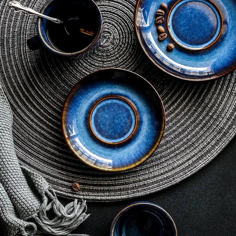 A handcrafted blue ceramic Istikan cup and saucer set, ideal for coffee and tea, showcasing elegant design and quality craftsmanship.