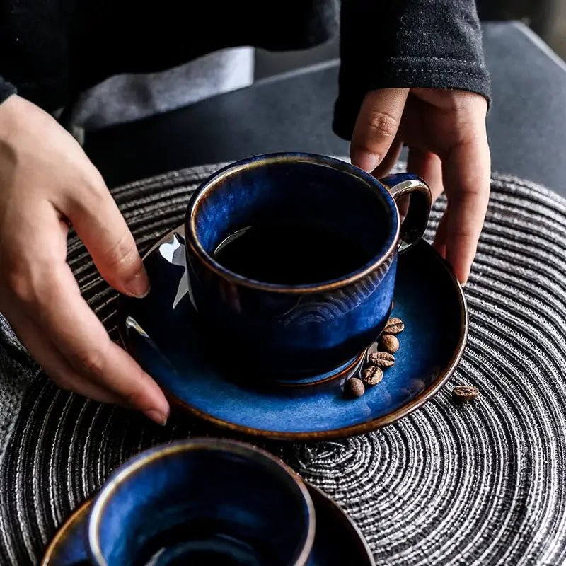 A handcrafted blue ceramic Istikan cup and saucer set, ideal for coffee and tea, showcasing elegant design and quality craftsmanship.