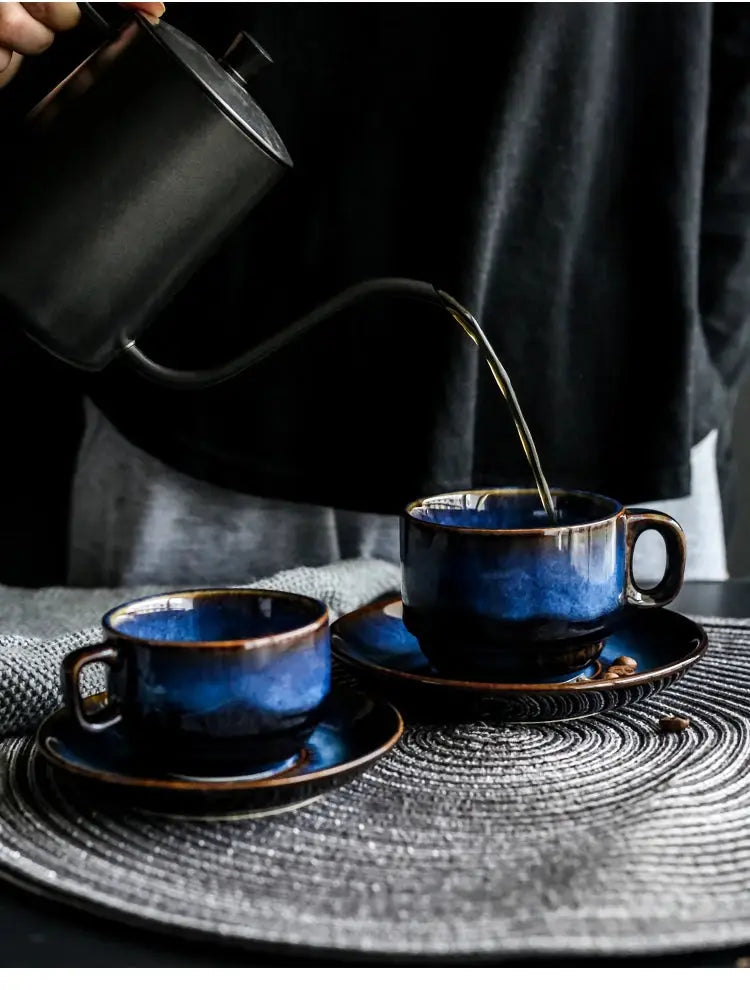 A handcrafted blue ceramic Istikan cup and saucer set, ideal for coffee and tea, showcasing elegant design and quality craftsmanship.