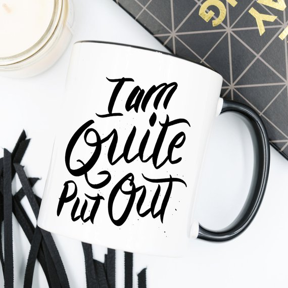 Jane Austen coffee mug featuring the phrase 'I Am Quite Put Out', crafted from high-grade ceramic, perfect for coffee lovers.