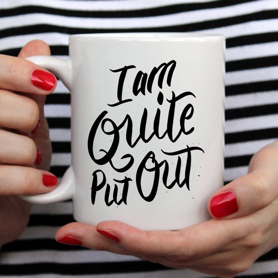 Jane Austen coffee mug featuring the phrase 'I Am Quite Put Out', crafted from high-grade ceramic, perfect for coffee lovers.