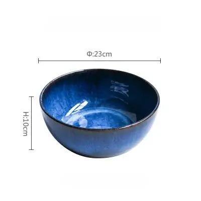 A handcrafted ceramic Kaia bowl in a subtle blue shade, ideal for serving sushi, ramen, and miso soup, showcasing its elegant and minimalist design.