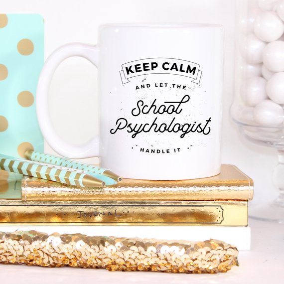 A humorous coffee mug featuring the phrase 'Keep Calm And Let The School Psychologist Handle It', made of high-quality ceramic.