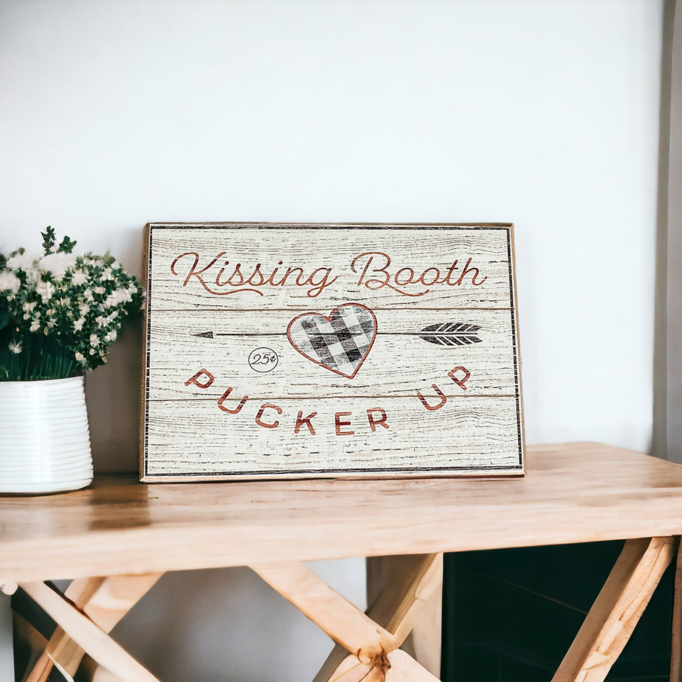 Handmade wooden Kissing Booth sign, perfect for Valentine's Day decor, showcasing a rustic design with a timeless appeal.