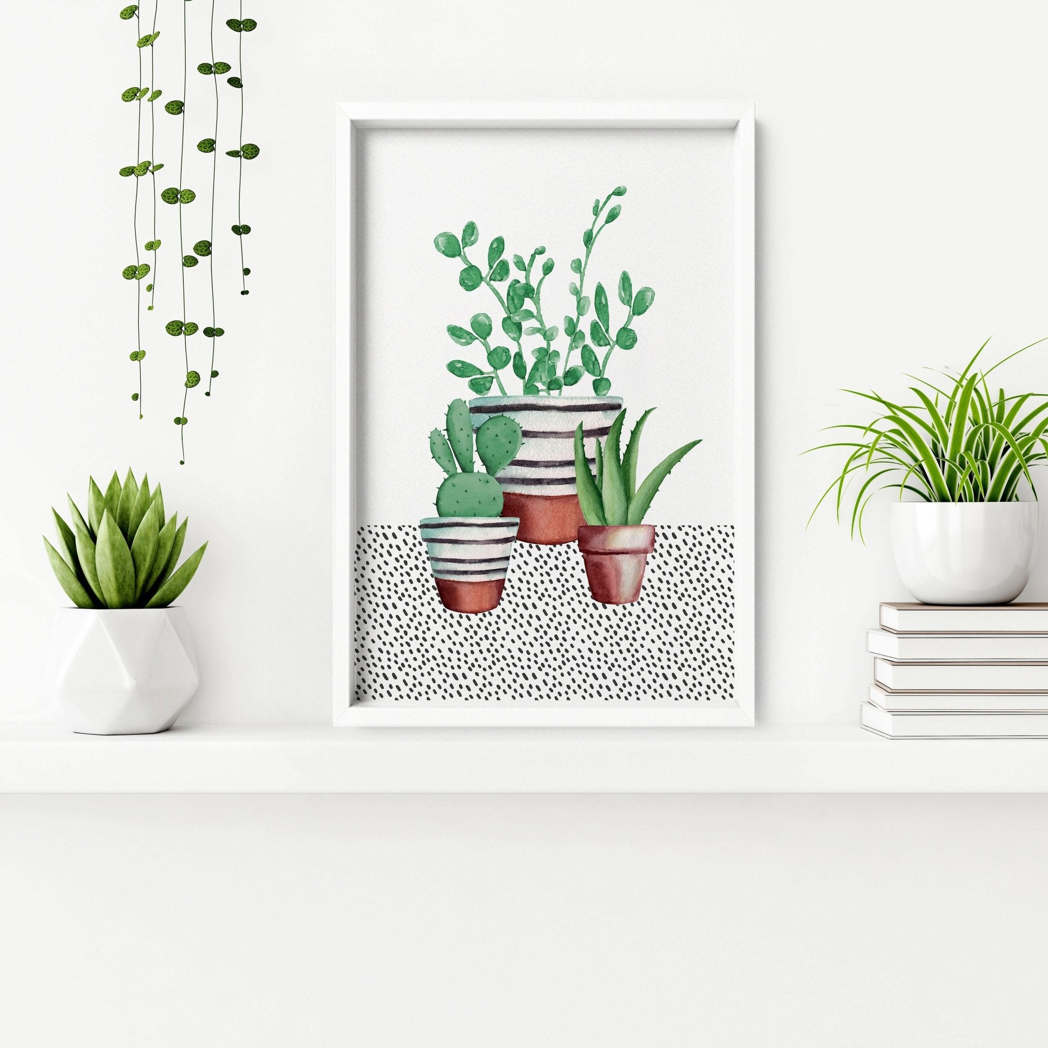 Set of 2 wall art prints featuring vibrant watercolour illustrations of succulent plants, perfect for kitchen decor.