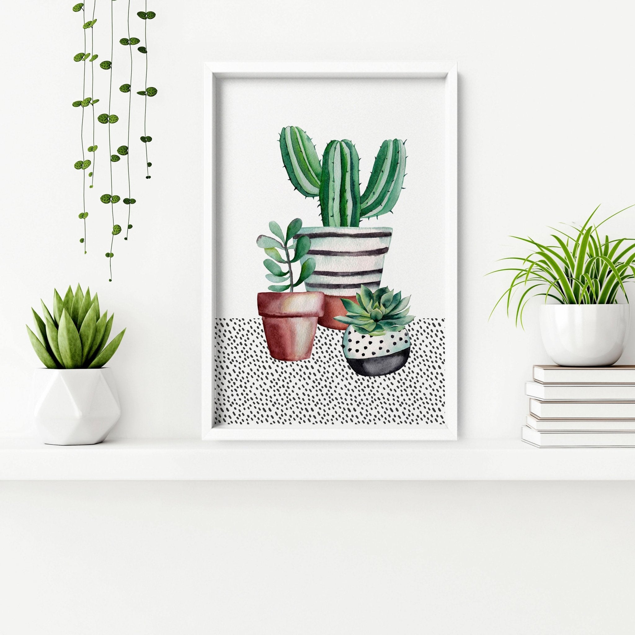 Set of 2 wall art prints featuring vibrant watercolour illustrations of succulent plants, perfect for kitchen decor.