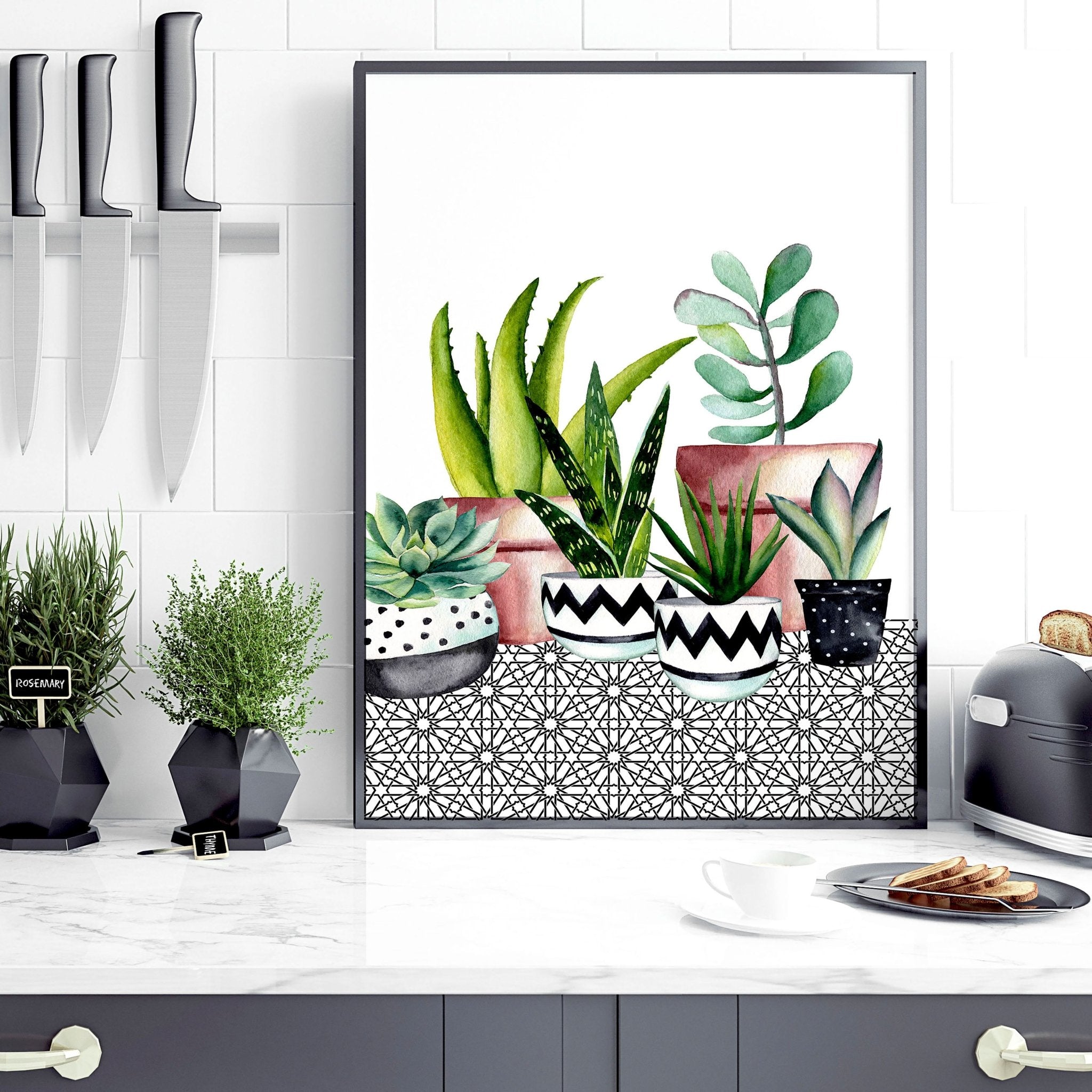 Set of 2 succulent wall art prints featuring vibrant watercolor illustrations, perfect for kitchen or dining room decor.