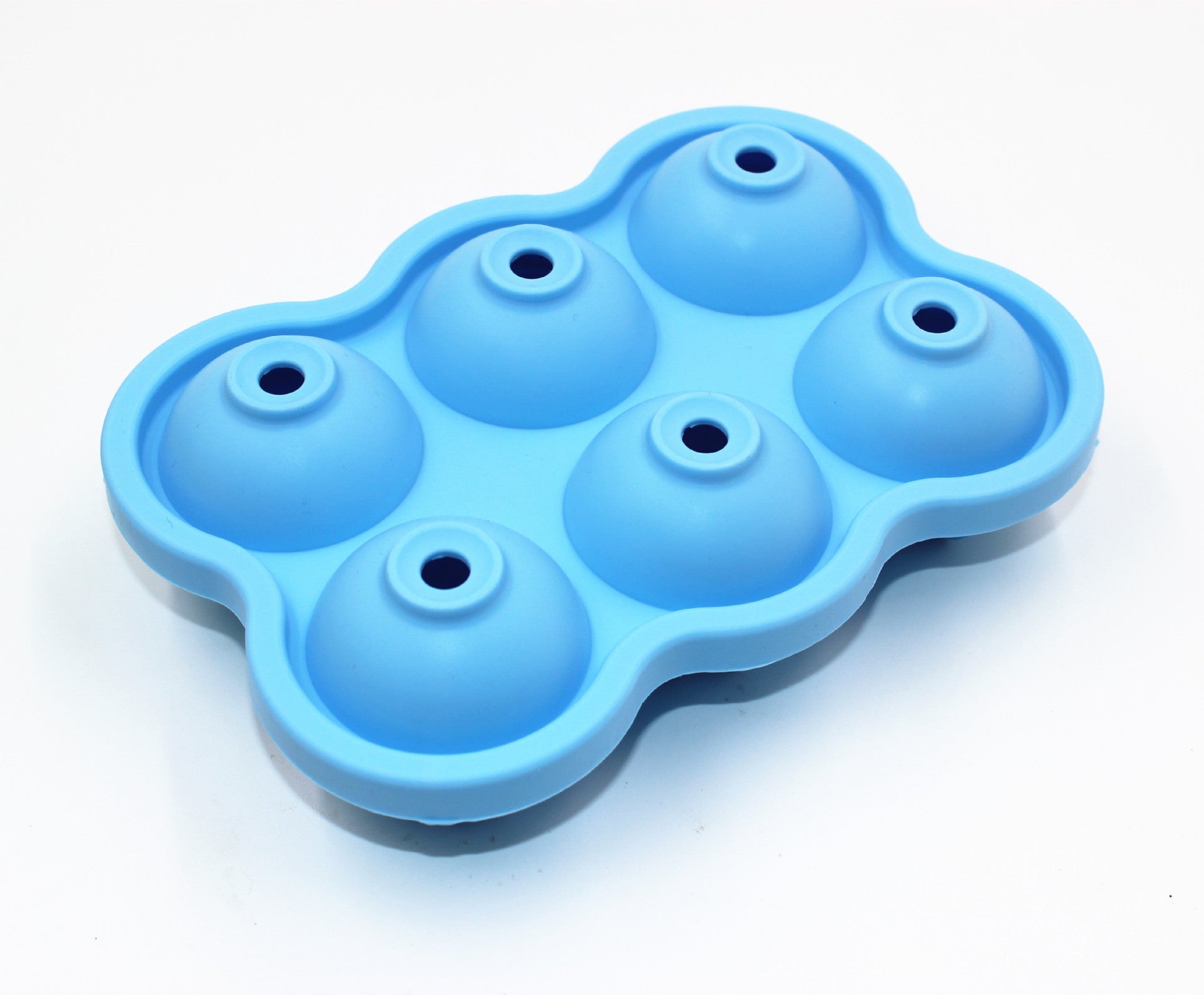 Large Ice Cube Maker Silicone Mold with six cells for making ice balls, showcasing its flexible design and food-grade silicone material.