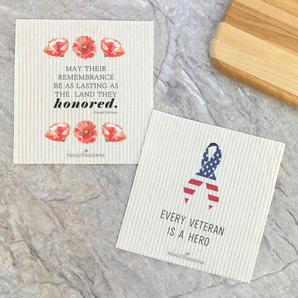 Two Swedish dish cloths featuring beautiful veteran-themed designs, made from eco-friendly materials.