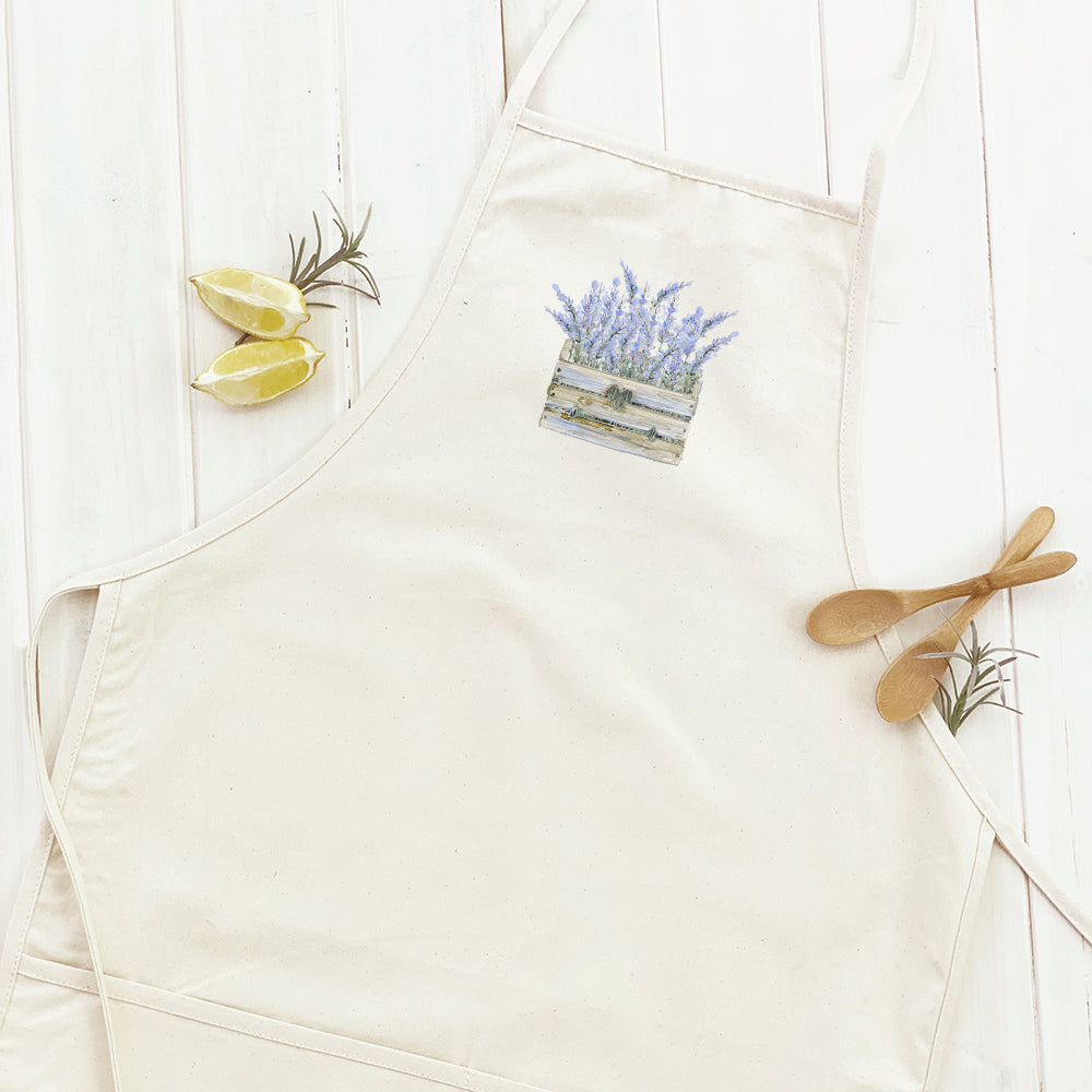 Lavender Basket Women's Apron made of cotton canvas with natural twill ties and a divided front pocket, featuring a beautiful lavender design.