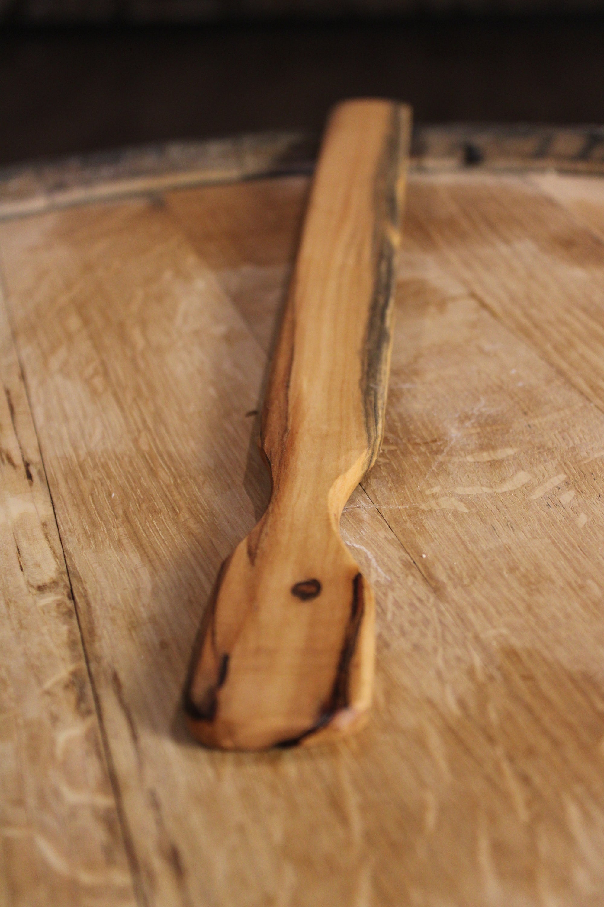 An 18-inch Lefse Stick made from high-quality maple lumber, featuring a tapered tip and smooth edges, ideal for rolling out dough.