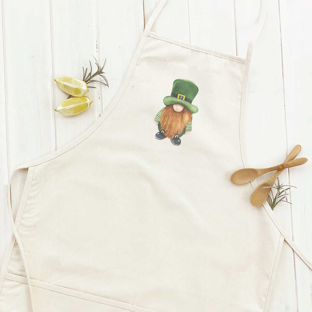 Leprechaun Women's Apron made of cotton canvas with natural twill ties, featuring a divided front pocket and eco-friendly print.