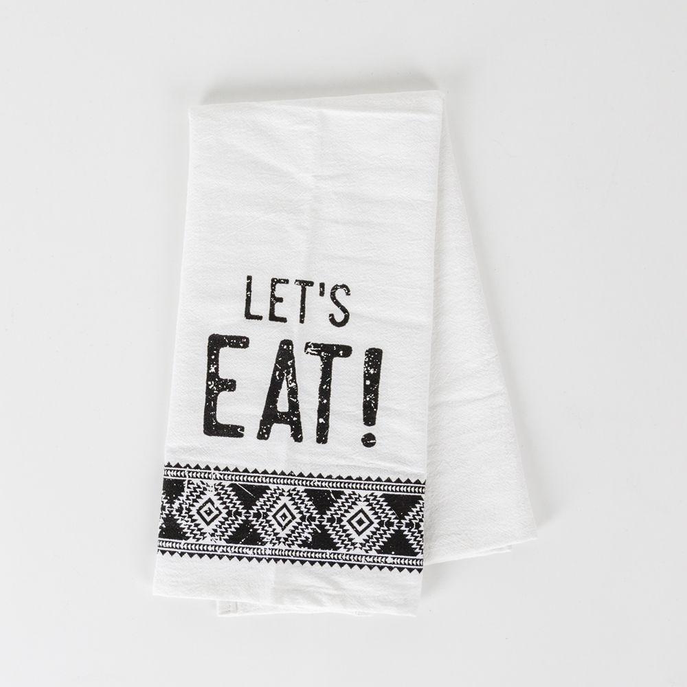 A stylish black and white tea towel featuring an Aztec design with the phrase 'Let's Eat!' printed on it, perfect for kitchen decor.