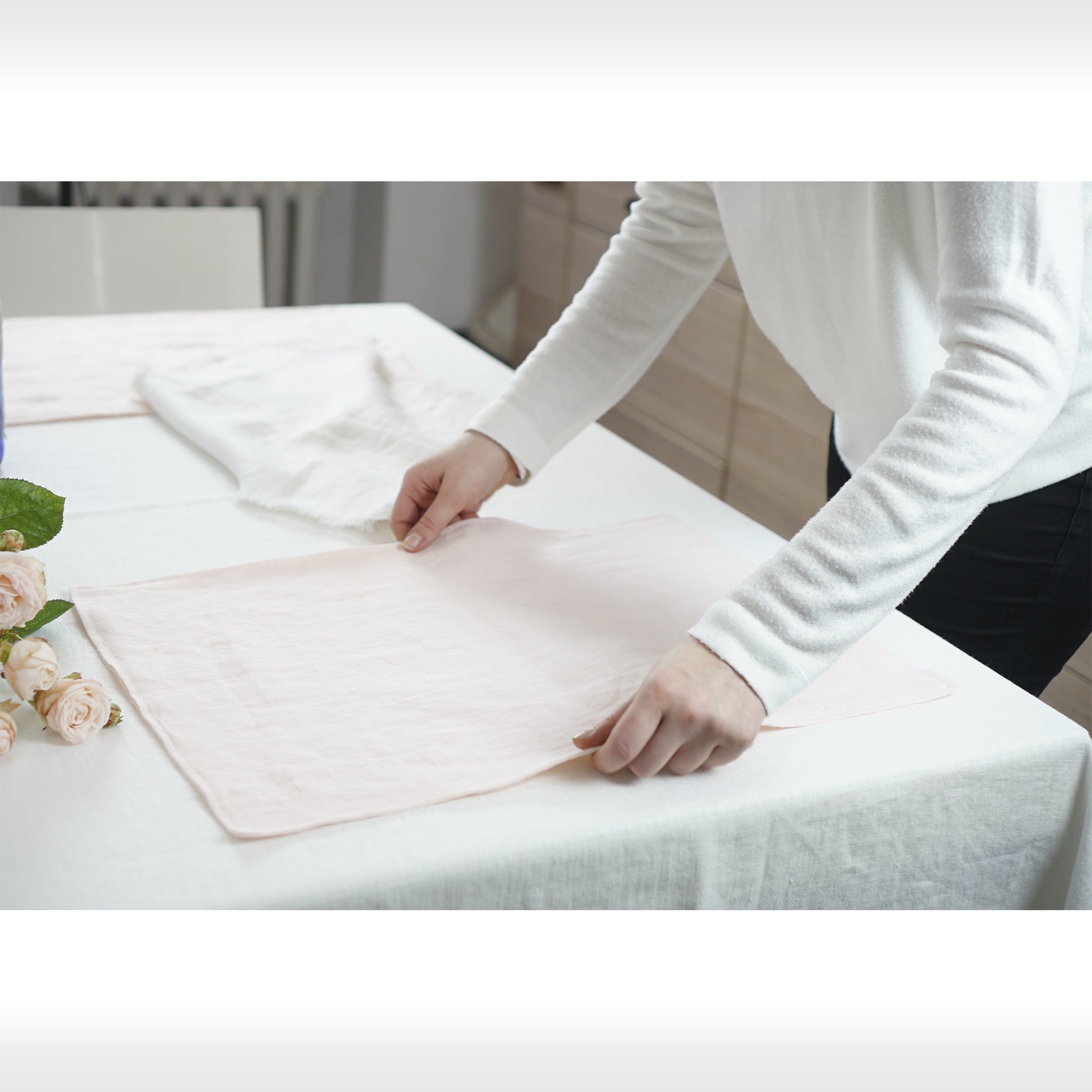 Light pink linen placemats set, handcrafted from natural stonewashed linen, elegantly styled for modern dining.