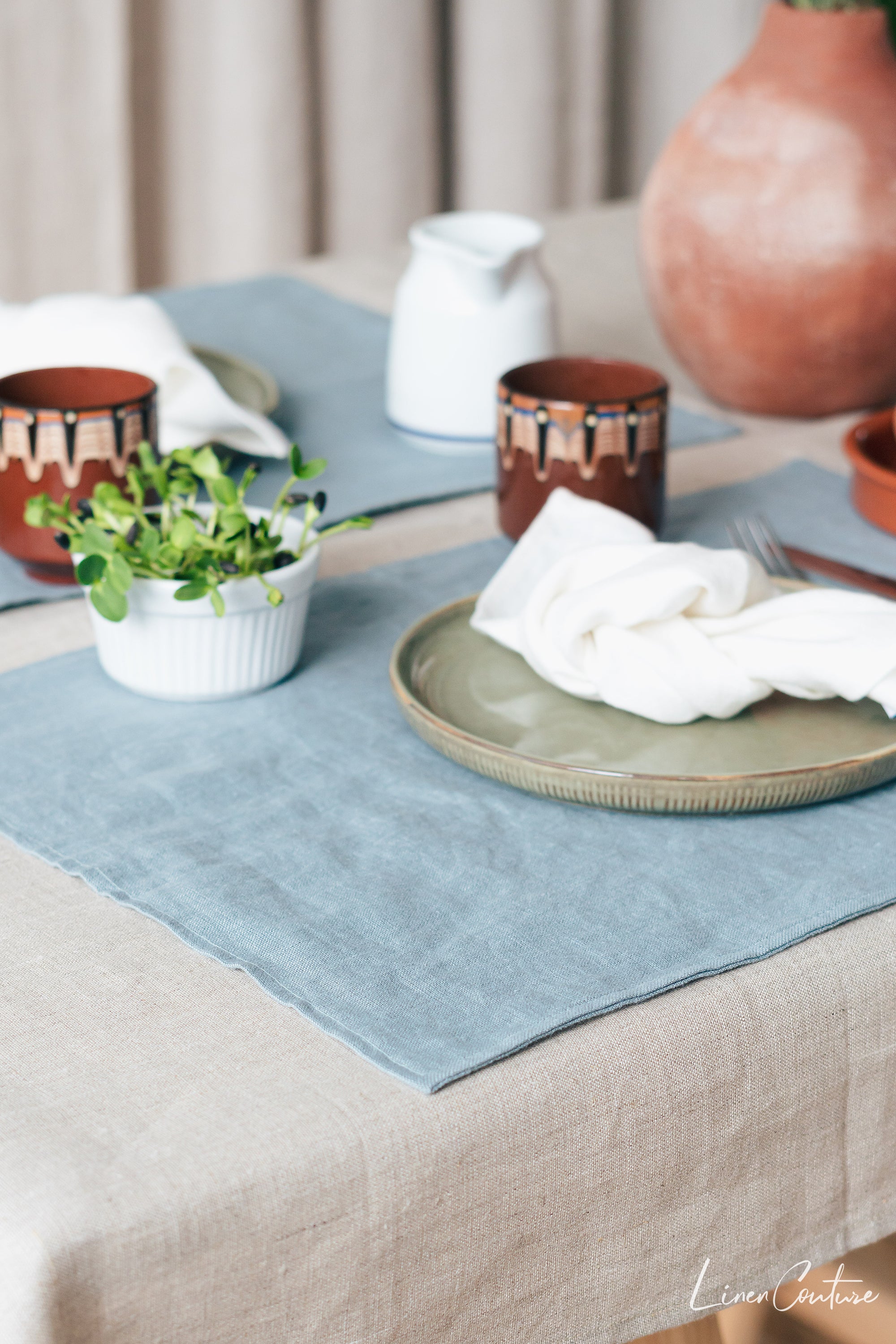 Light pink linen placemats set, handcrafted from natural stonewashed linen, elegantly styled for modern dining.