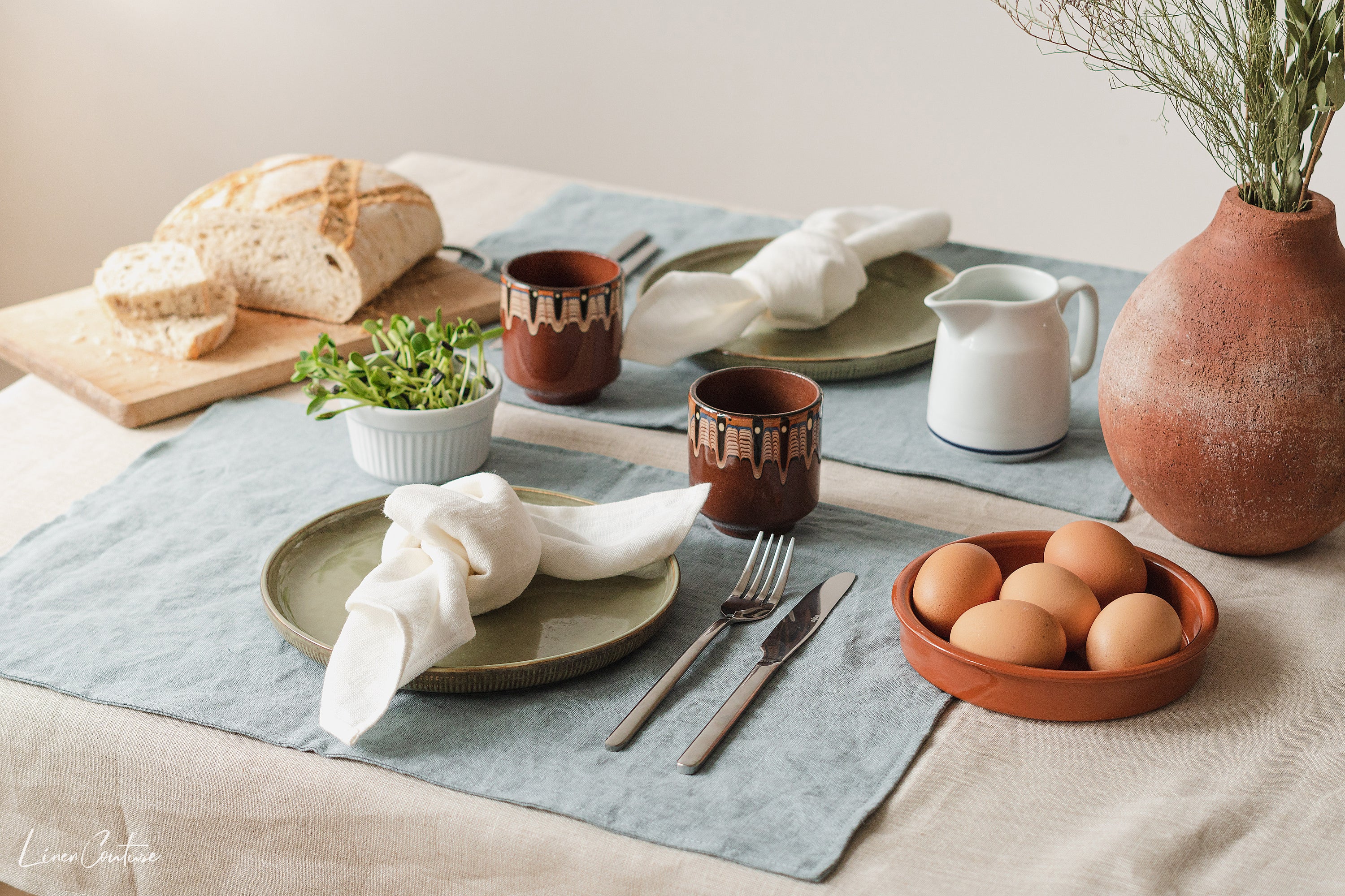 Light pink linen placemats set, handcrafted from natural stonewashed linen, elegantly styled for modern dining.