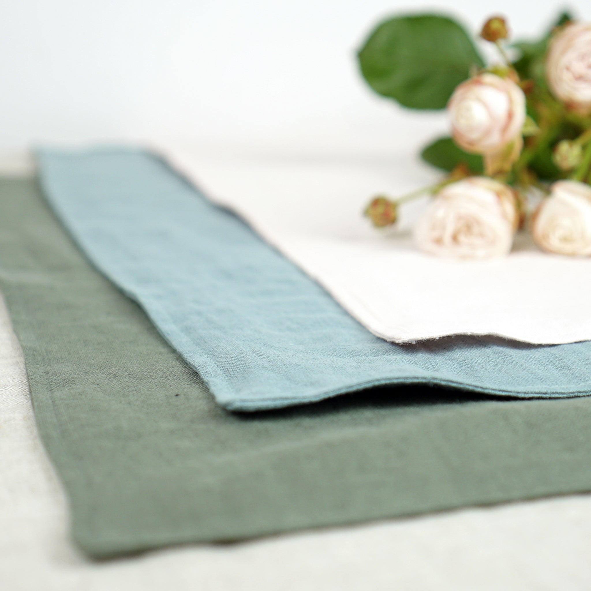 Light pink linen placemats set, handcrafted from natural stonewashed linen, elegantly styled for modern dining.