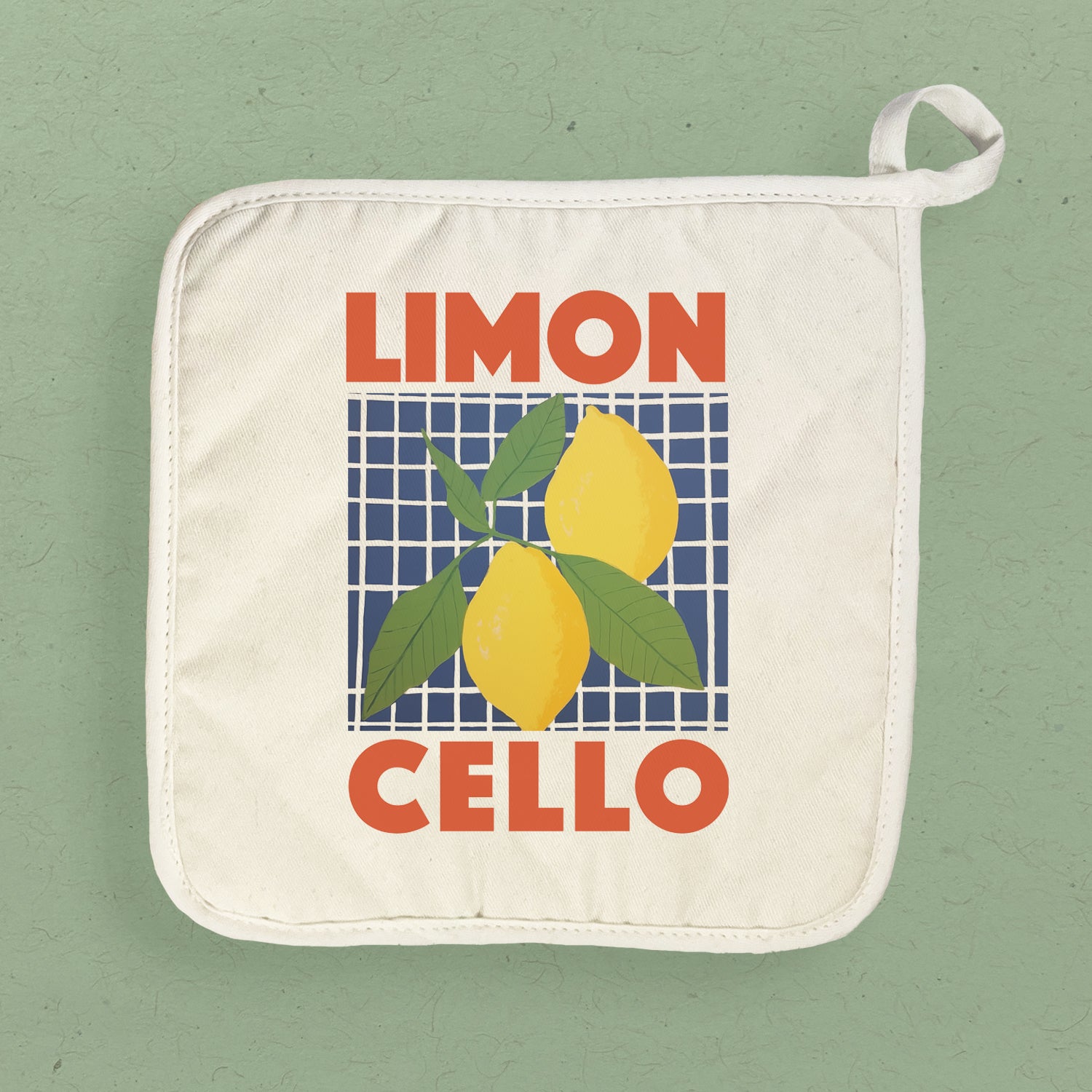 Limoncello Cotton Pot Holder featuring vibrant designs and a convenient hanging loop, perfect for protecting surfaces from hot cookware.