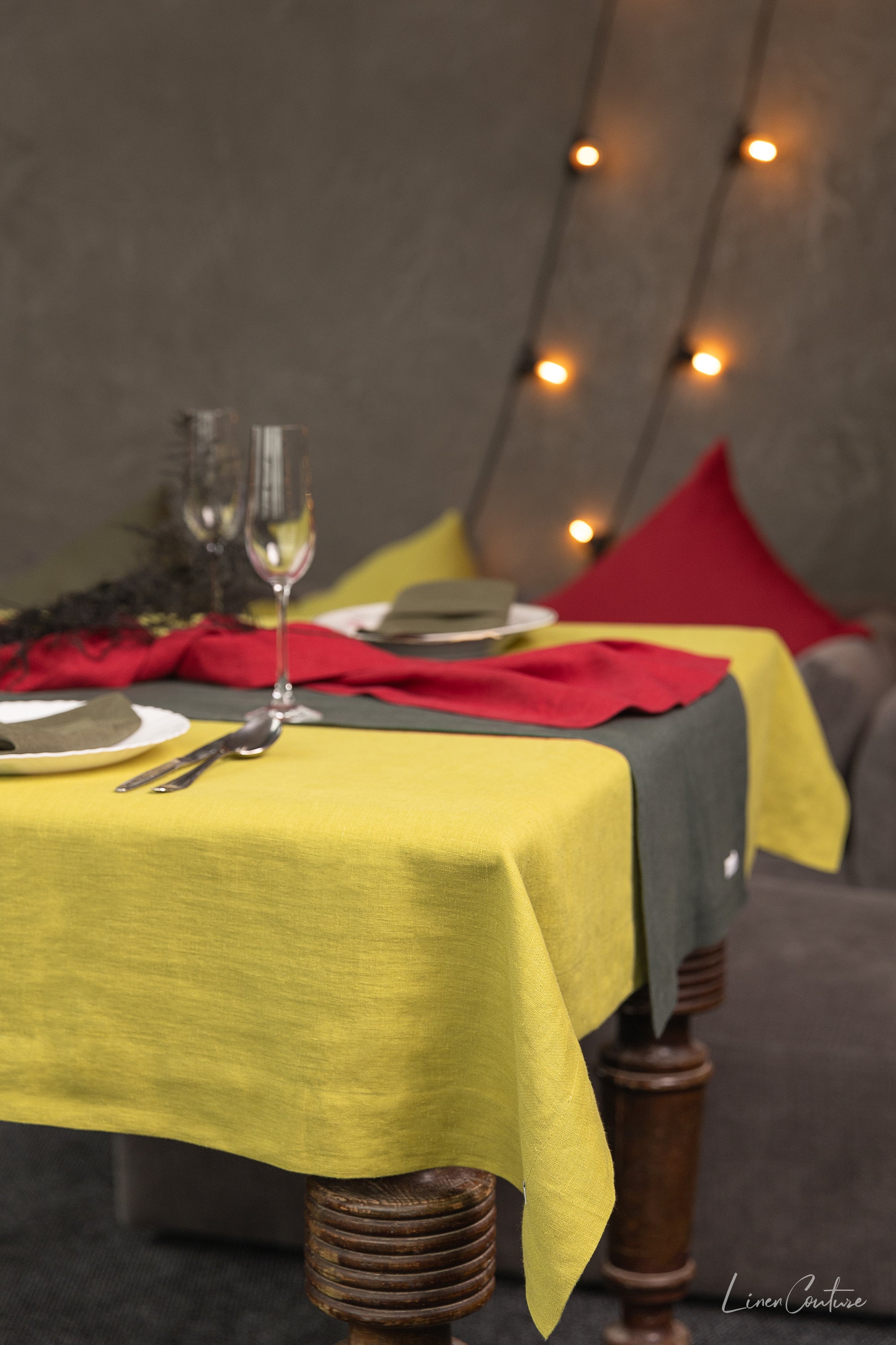 Elegant linen tablecloths in various colors and sizes, showcasing high-quality European linen with a decorative hem.