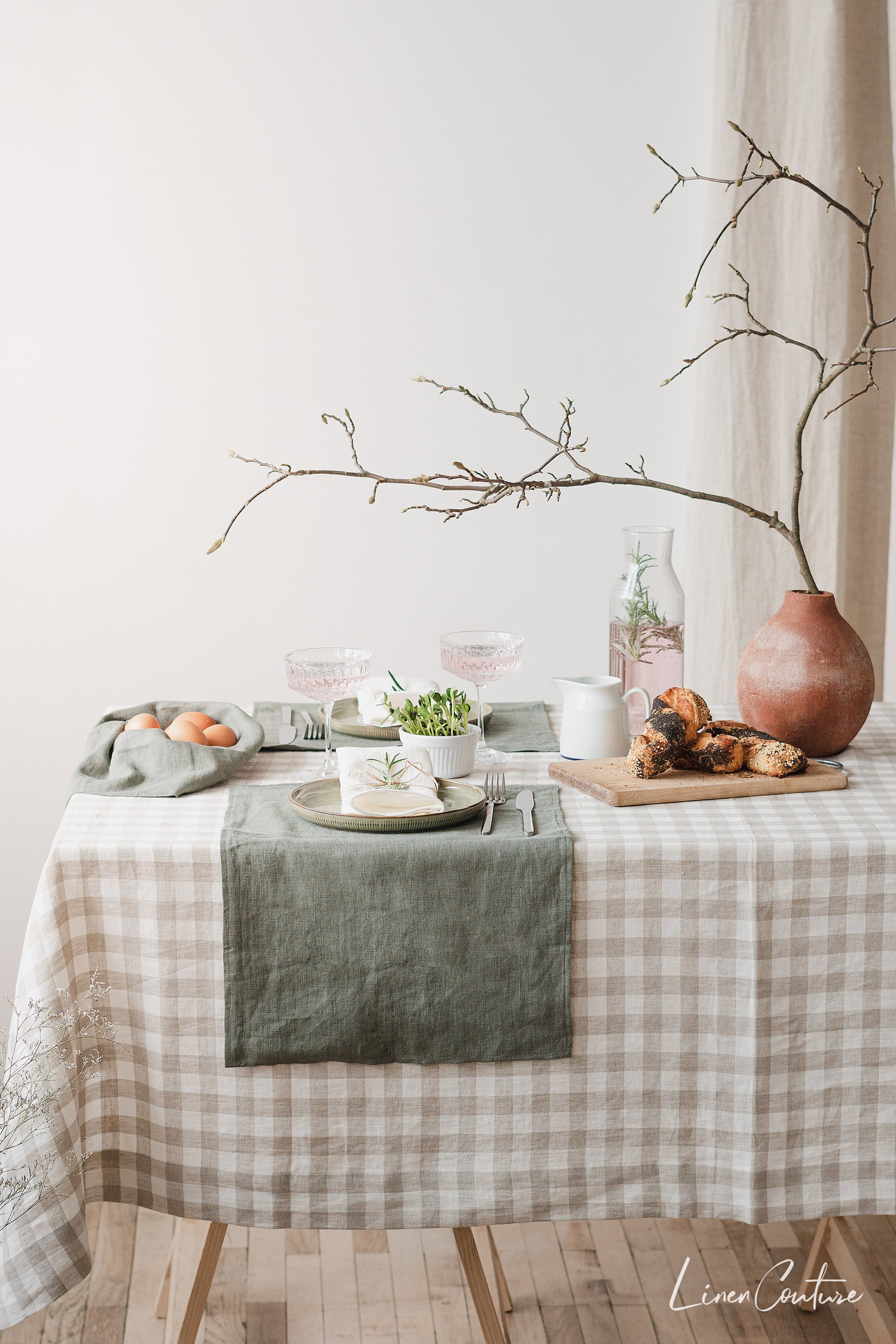 Elegant linen tablecloths in various colors and sizes, showcasing high-quality European linen with a decorative hem.