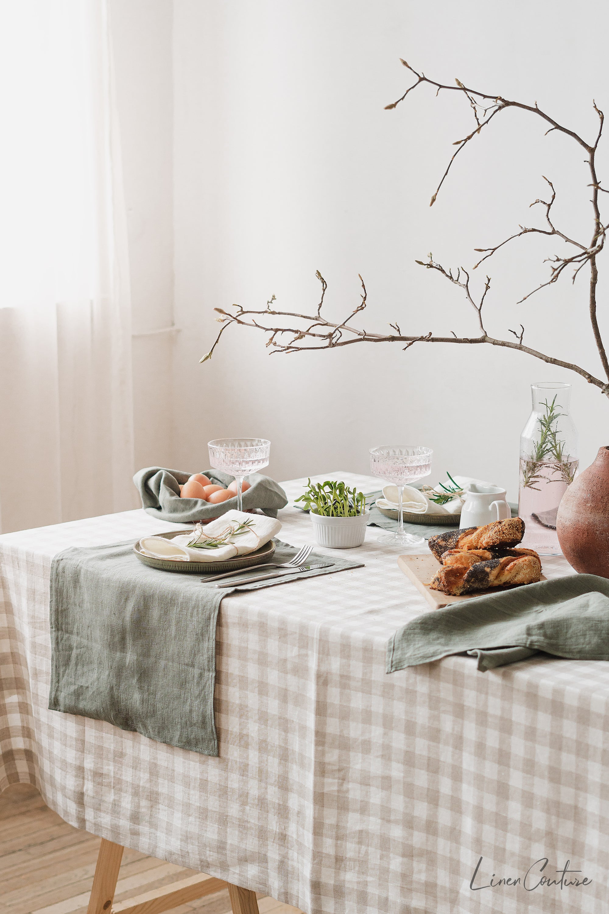 Elegant linen tablecloths in various colors and sizes, showcasing high-quality European linen with a decorative hem.