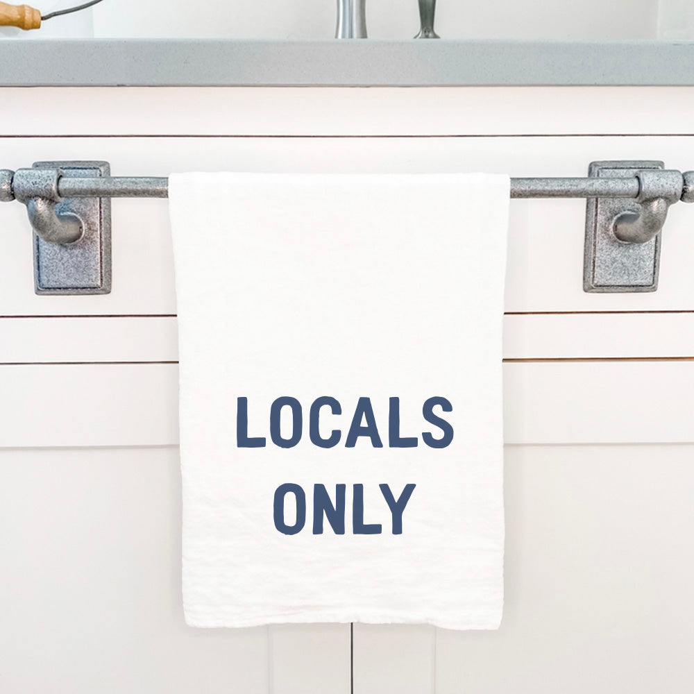 Locals Only Cotton Tea Towel featuring vibrant water-based ink designs, absorbent 100% cotton material, and hemmed edges.