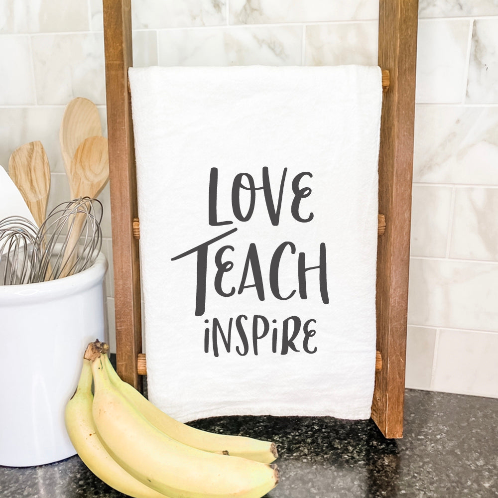 Love Teach Inspire Cotton Tea Towel featuring vibrant colors and inspirational design, made from 100% absorbent cotton.