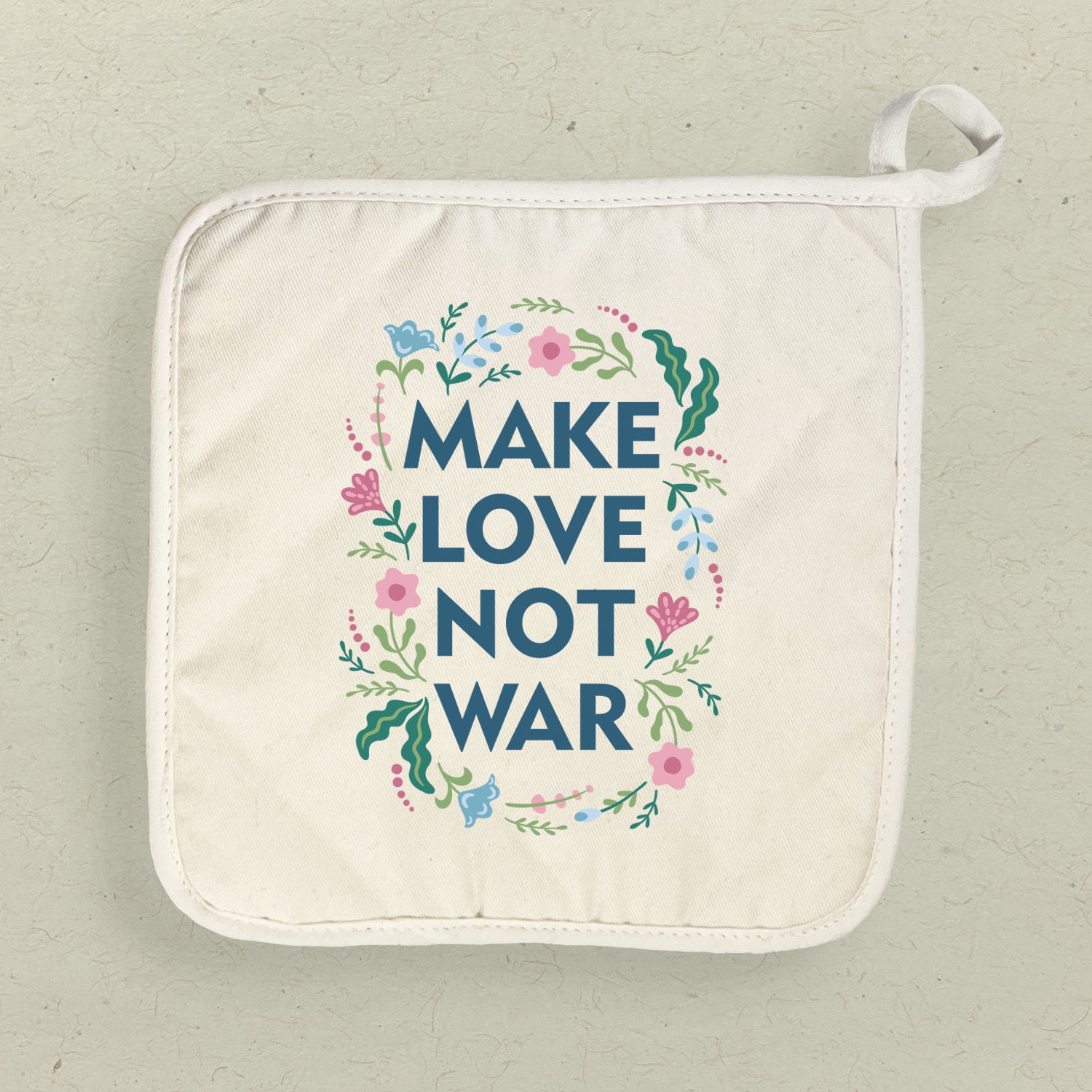 Make Love Not War Cotton Pot Holder featuring vibrant designs and a convenient hanging loop.