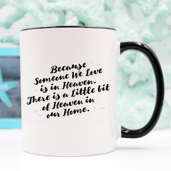 A personalized sympathy gift mug featuring a humorous design that reads 'There Is A Little Bit Of Heaven In Our Home', made from high-quality ceramic.