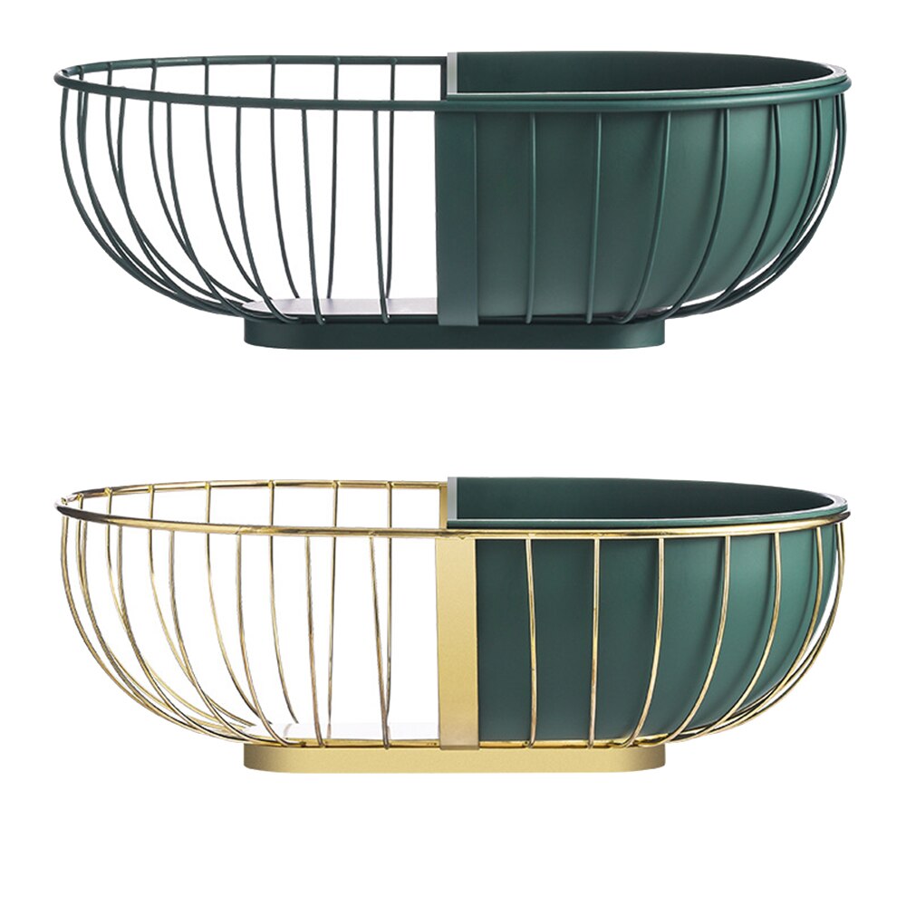 A stylish metal hollowed out fruit and vegetable snack tray bowl basket in dark green and gold, showcasing a variety of fresh fruits and snacks.