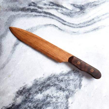 Model B Chef Knife made from eco-friendly urban waste lumber, featuring a sharp blade and sleek design.