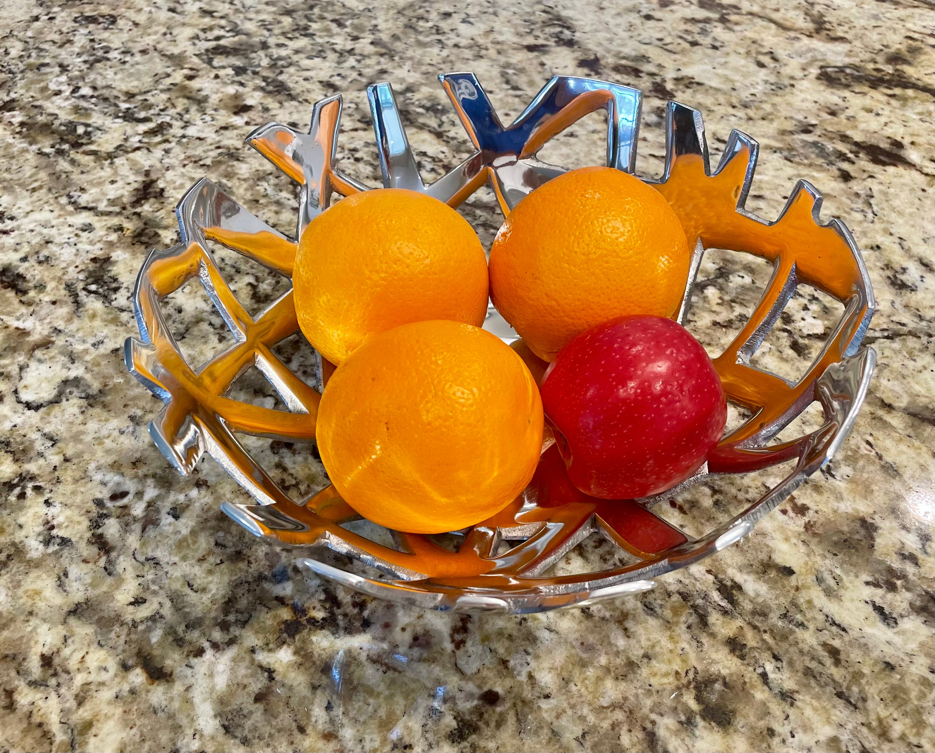 A handcrafted modern fruit and bread tray made from recycled aluminum alloy, featuring clean lines and a sleek design, perfect for kitchen decor.