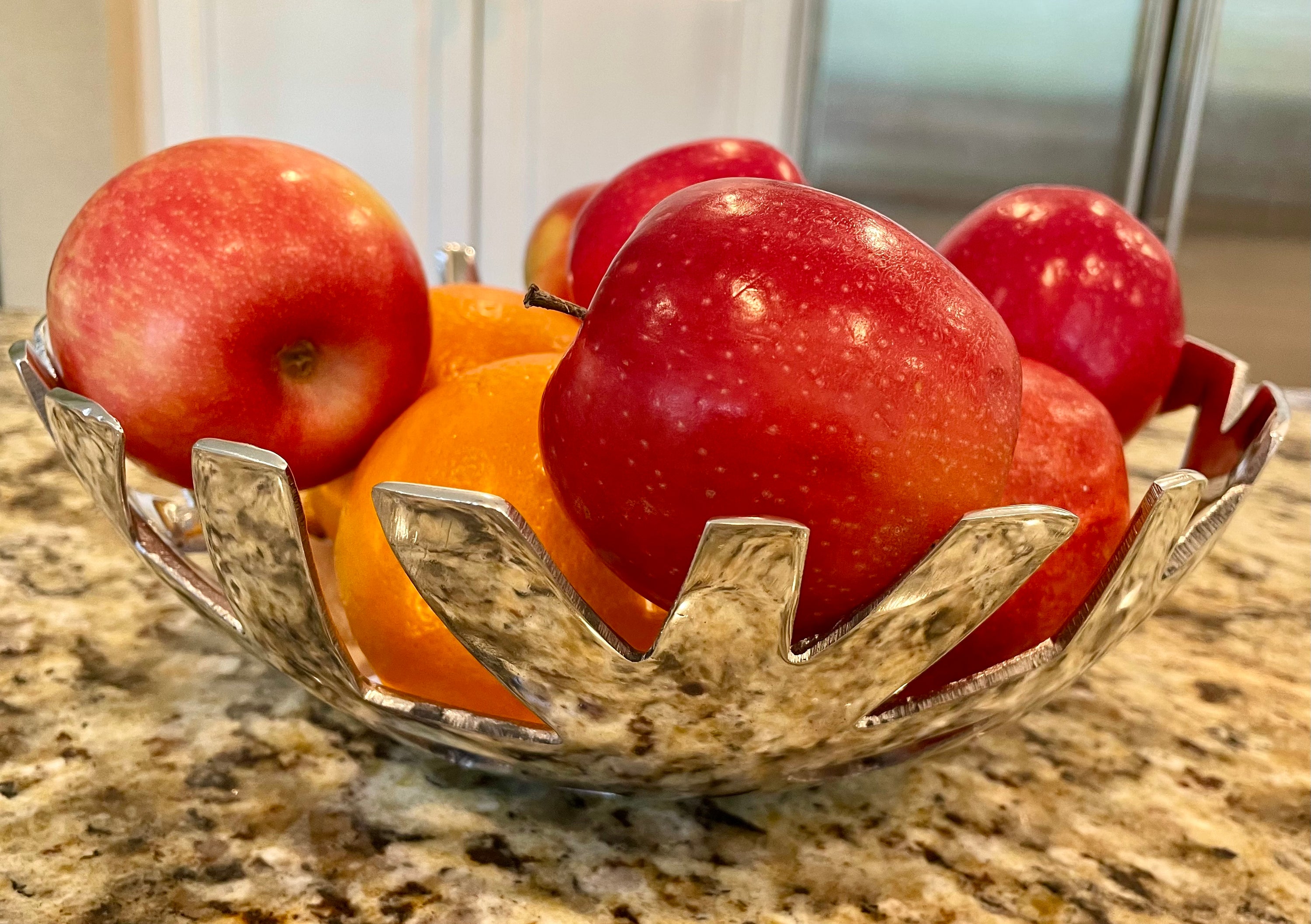 A handcrafted modern fruit and bread tray made from recycled aluminum alloy, featuring clean lines and a sleek design, perfect for kitchen decor.