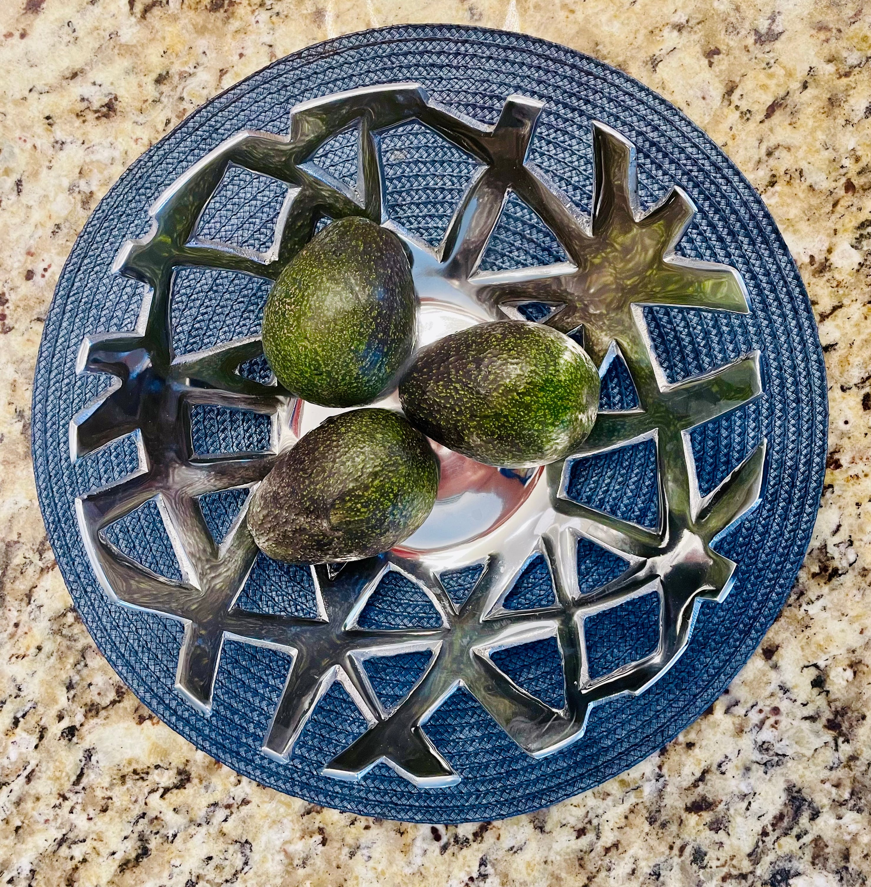 A handcrafted modern fruit and bread tray made from recycled aluminum alloy, featuring clean lines and a sleek design, perfect for kitchen decor.