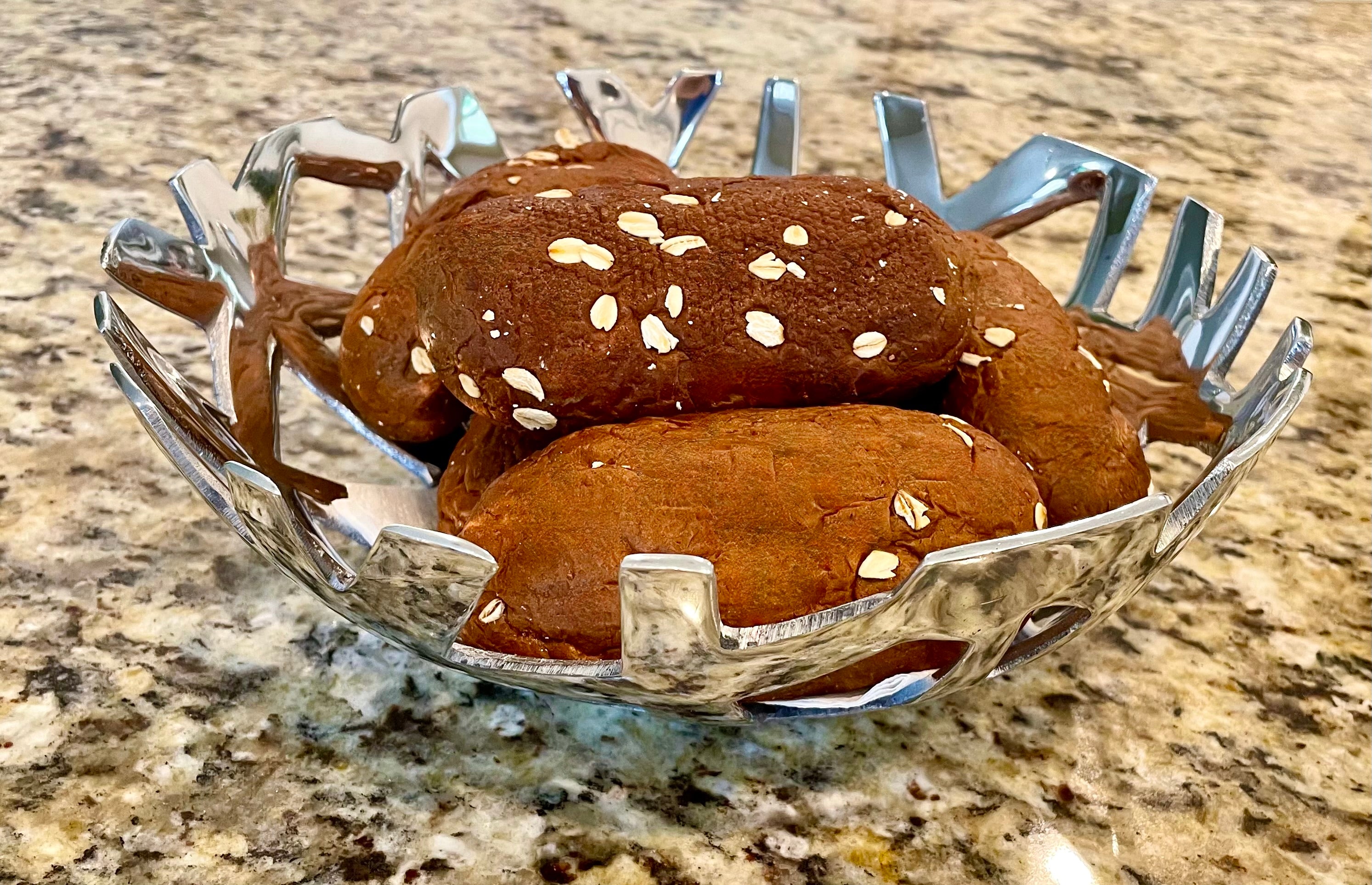 A handcrafted modern fruit and bread tray made from recycled aluminum alloy, featuring clean lines and a sleek design, perfect for kitchen decor.