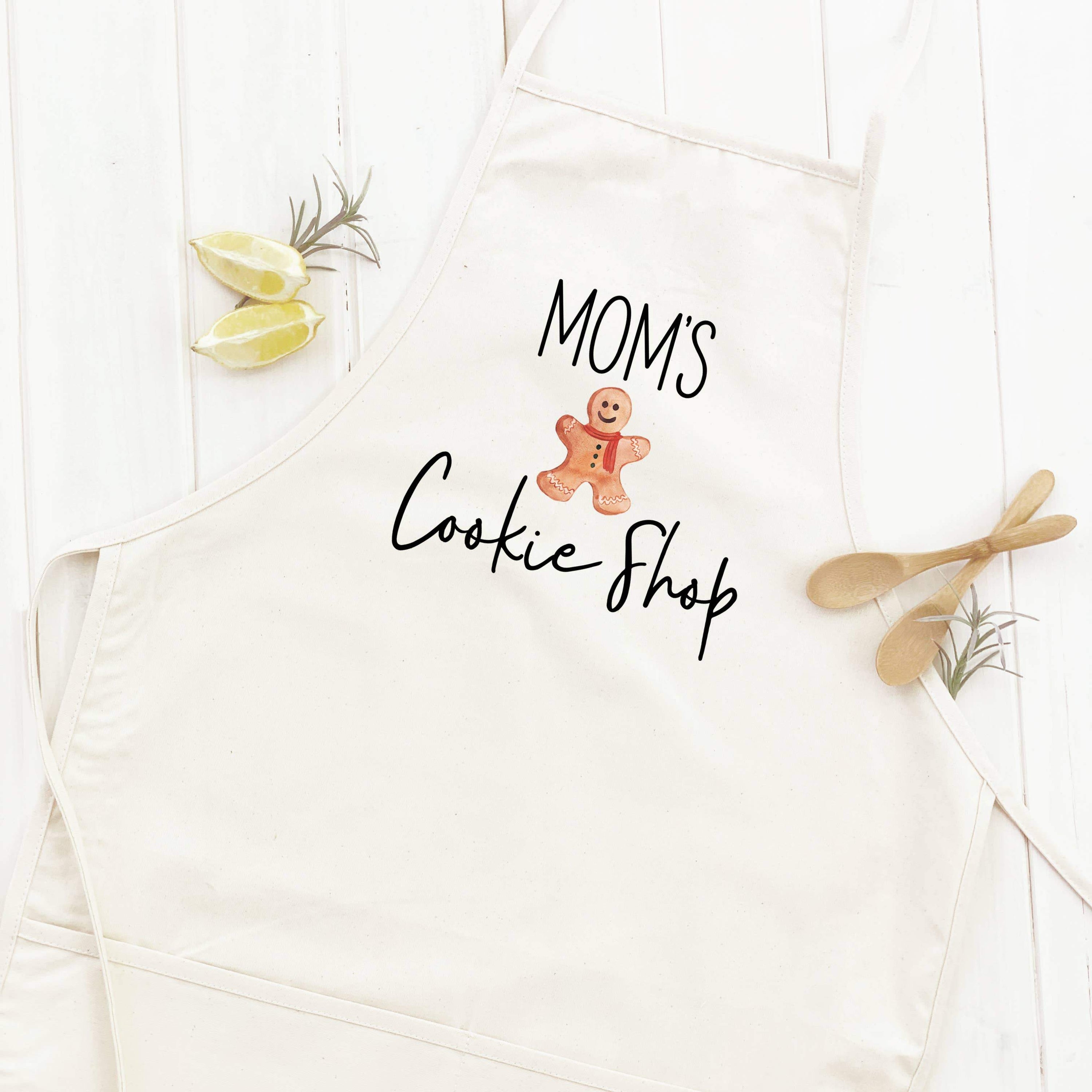 Mom's Cookie Shop Women's Apron in elegant design, made from durable cotton canvas with natural twill ties and a divided front pocket.