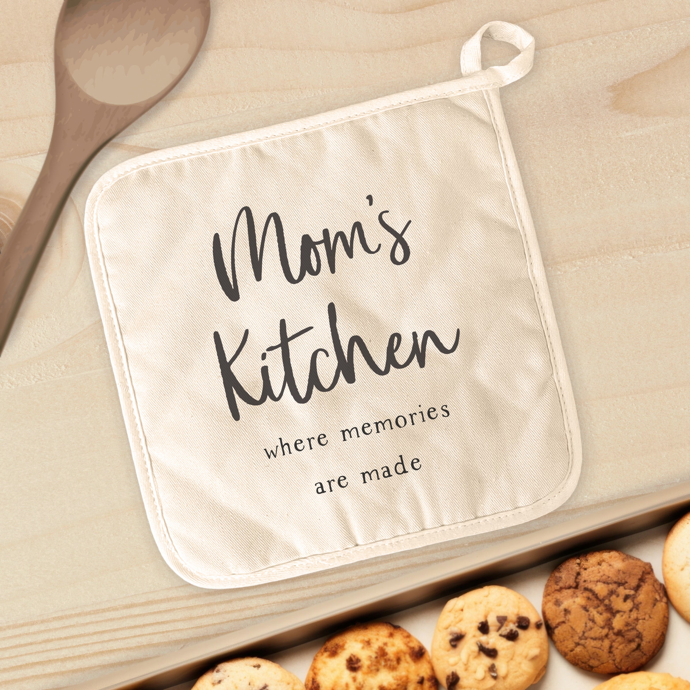 Mom's Kitchen Cotton Pot Holder in natural color with vibrant printed design, featuring a convenient hanging loop.