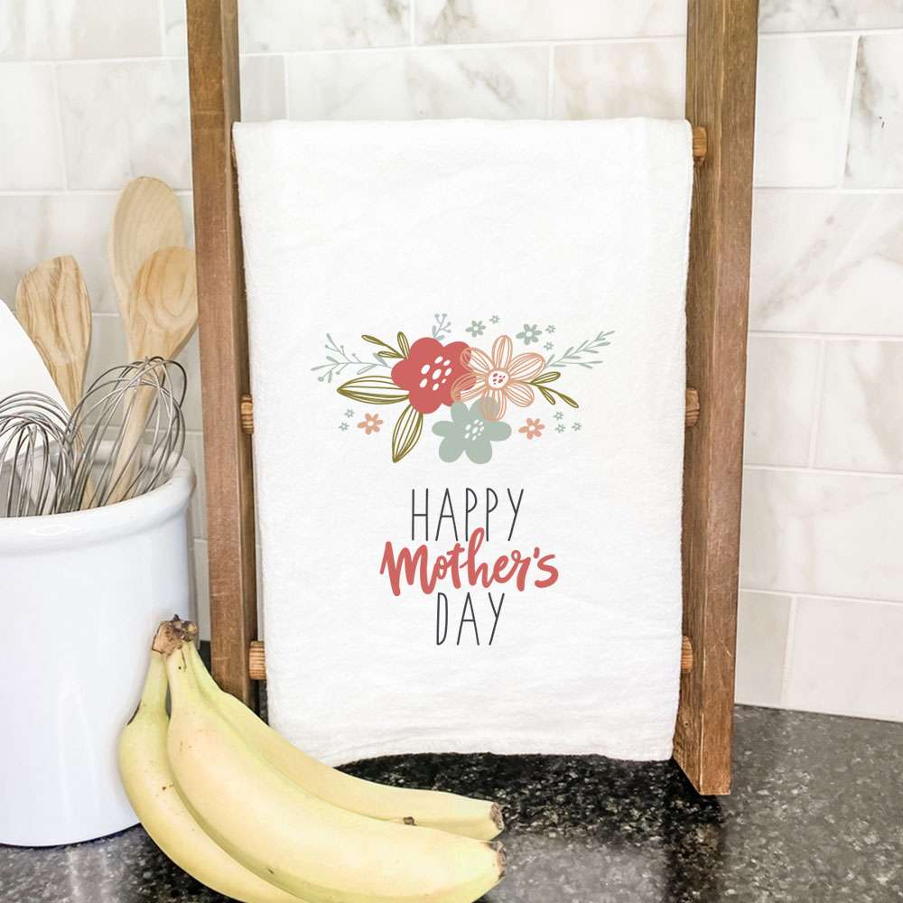 A beautifully designed cotton tea towel featuring vibrant floral prints, perfect for Mother's Day gifts, showcasing absorbent fabric and hemmed edges.