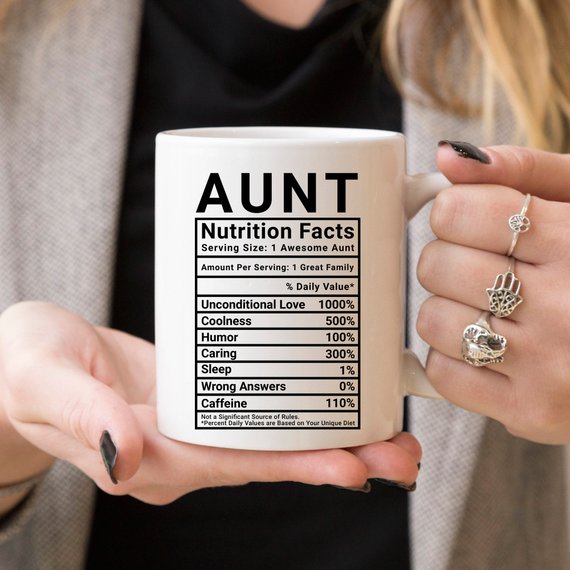 Aunt Nutritional Facts Funny Coffee Mug featuring humorous design with nutritional facts, crafted from high-quality ceramic, ideal for coffee or tea.