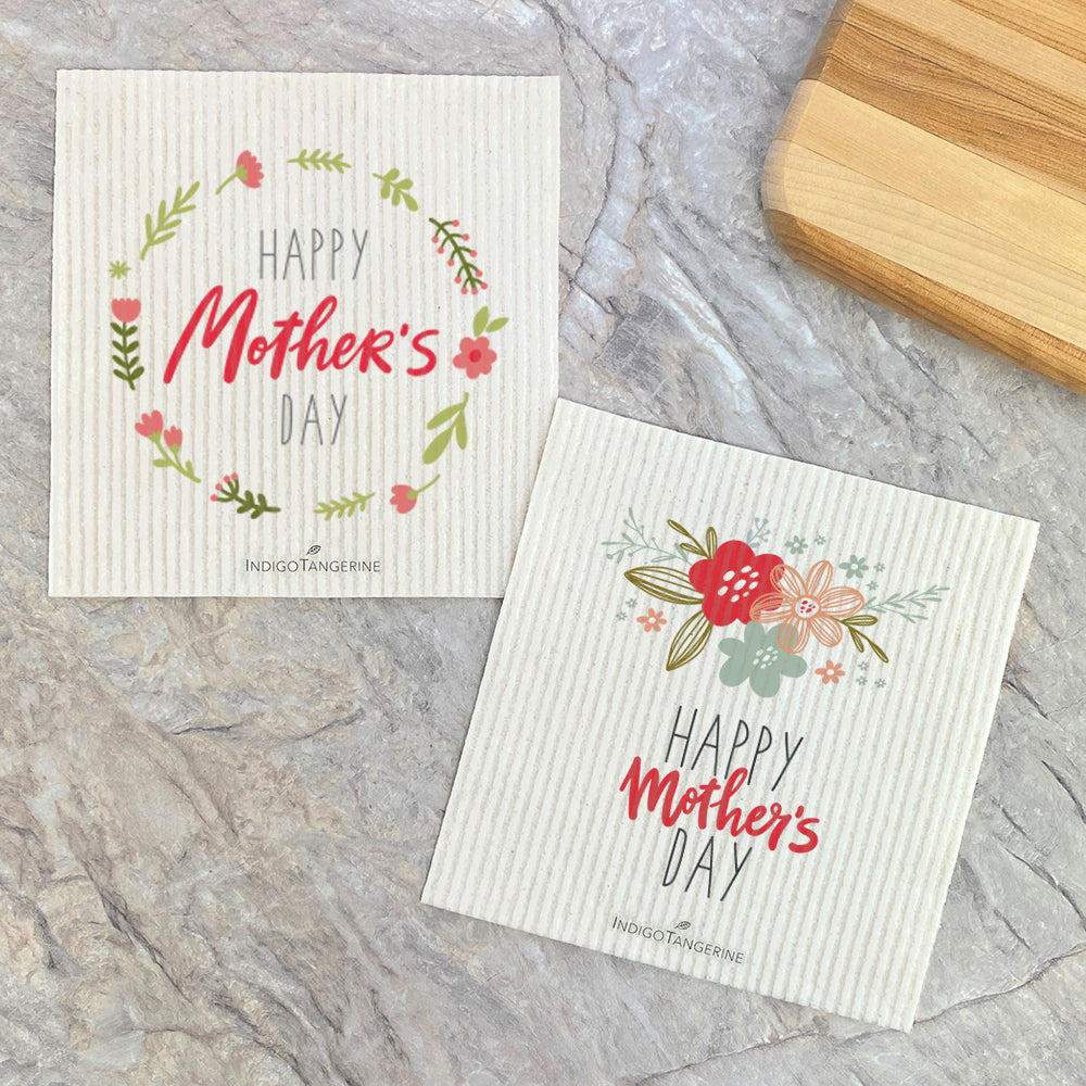 Two eco-friendly Swedish dish cloths with floral designs, perfect for Mother's Day cleaning.