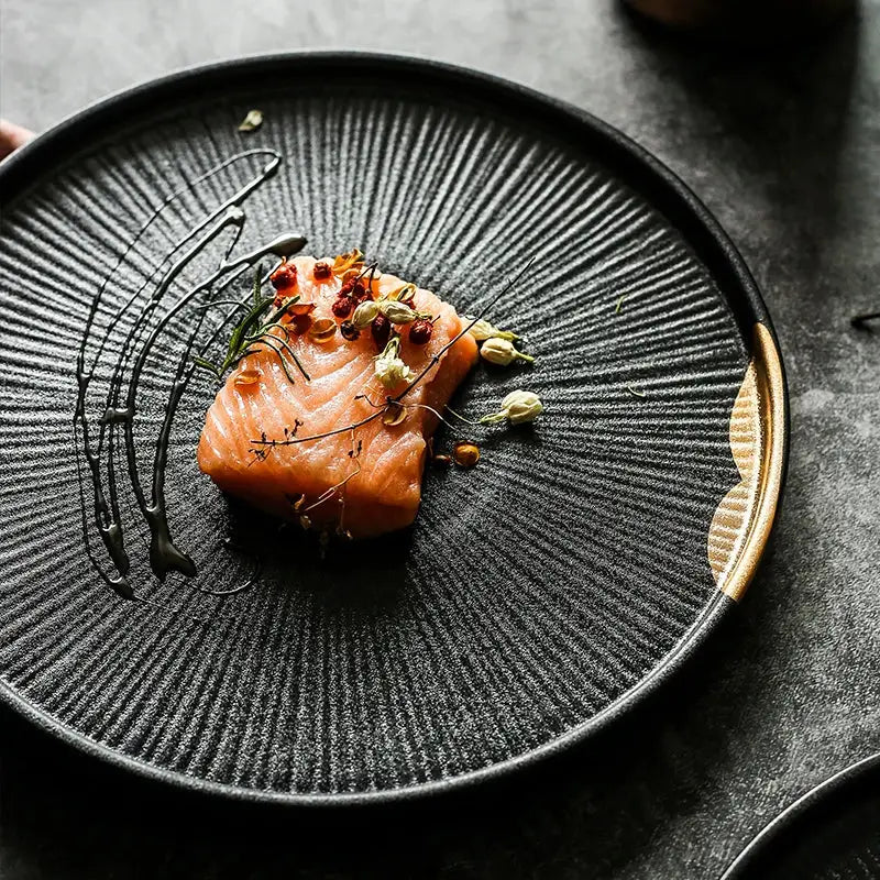 Elegant black Moyu Plate, handcrafted ceramic with traditional Japanese design, perfect for sophisticated dining.