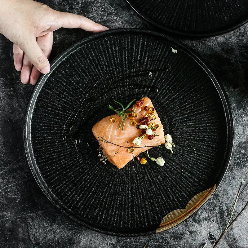 Elegant black Moyu Plate, handcrafted ceramic with traditional Japanese design, perfect for sophisticated dining.