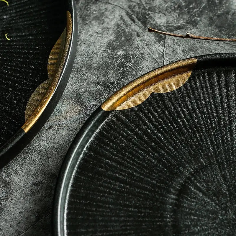 Elegant black Moyu Plate, handcrafted ceramic with traditional Japanese design, perfect for sophisticated dining.