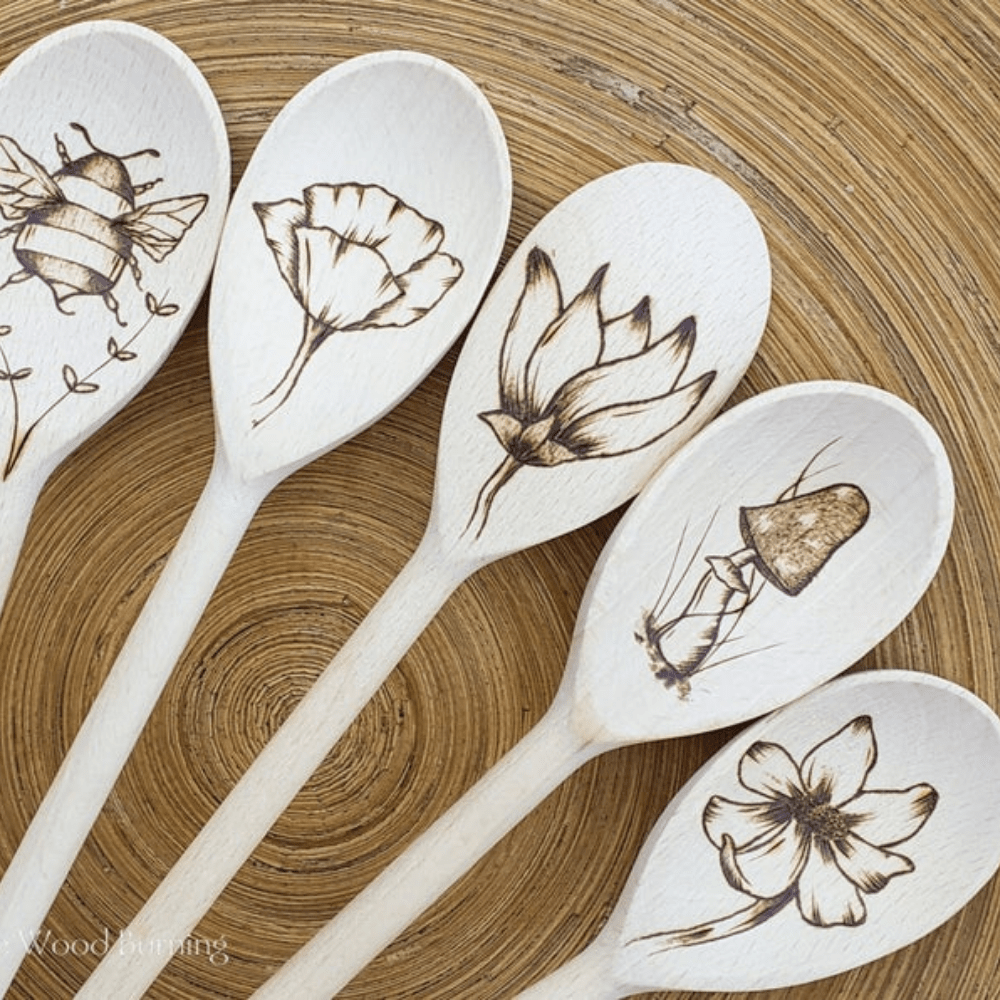 A set of 12 Mr. Woodware wooden kitchen spoons, each 12 inches long, showcasing their smooth finish and sturdy design, perfect for cooking and crafting.