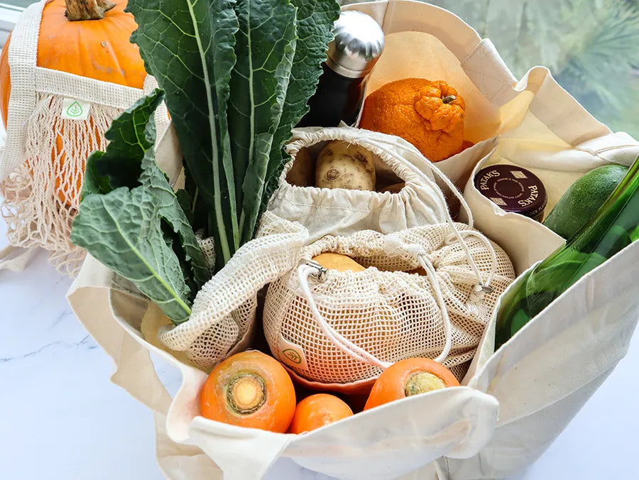 Multi-pocket Tote Bag made from organic cotton, featuring six pockets for secure grocery storage.